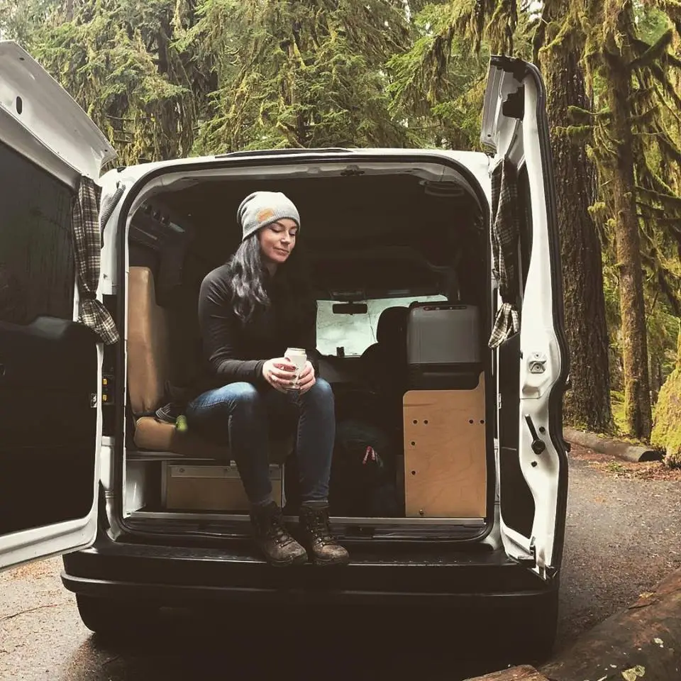 Cascade builder and operations manager Isla Chapple enjoys the view out the back of the camper van
