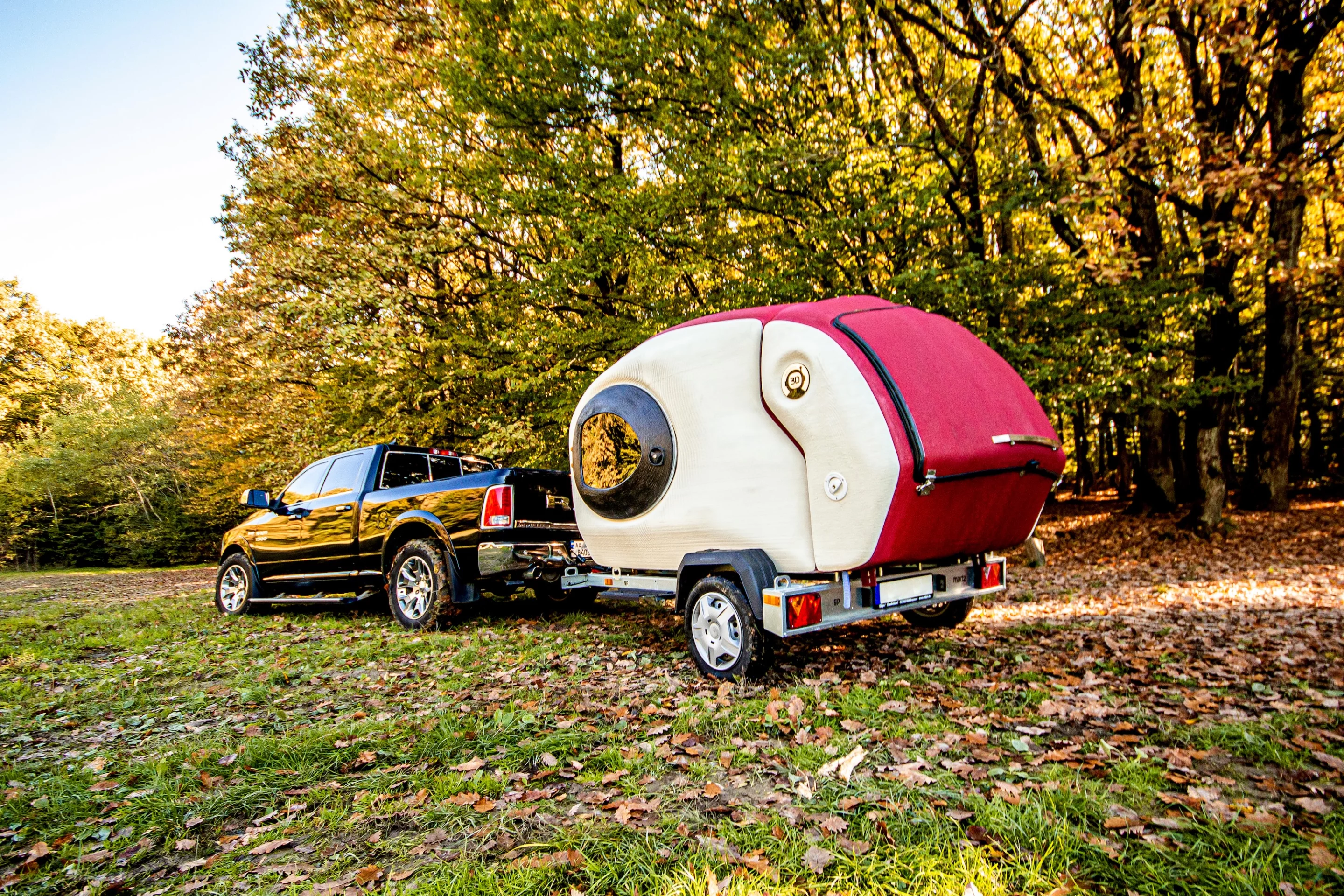 The Discover 3D is a 3D-printed teardrop camper that sleeps a family of three and has a small tailgate galley