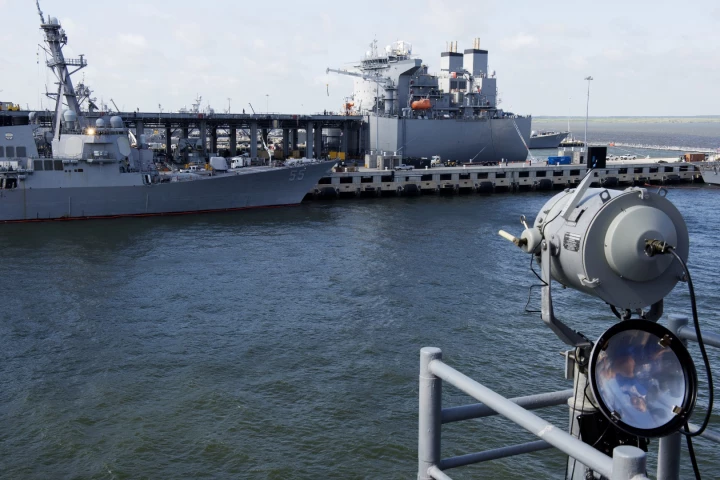 Sailors aboard the guided-missile cruiser USS Monterey (CG 61) communicate with the guided-missile destroyer USS Stout (DDG 55) during a test of the Flashing Light to Text Converter (FLTC)