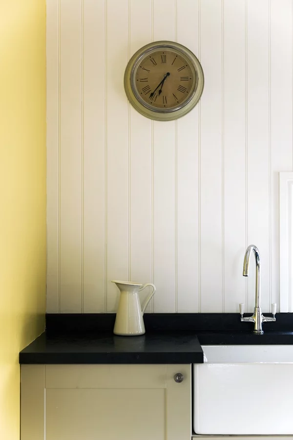 A view of the clock and sink in the Floating House