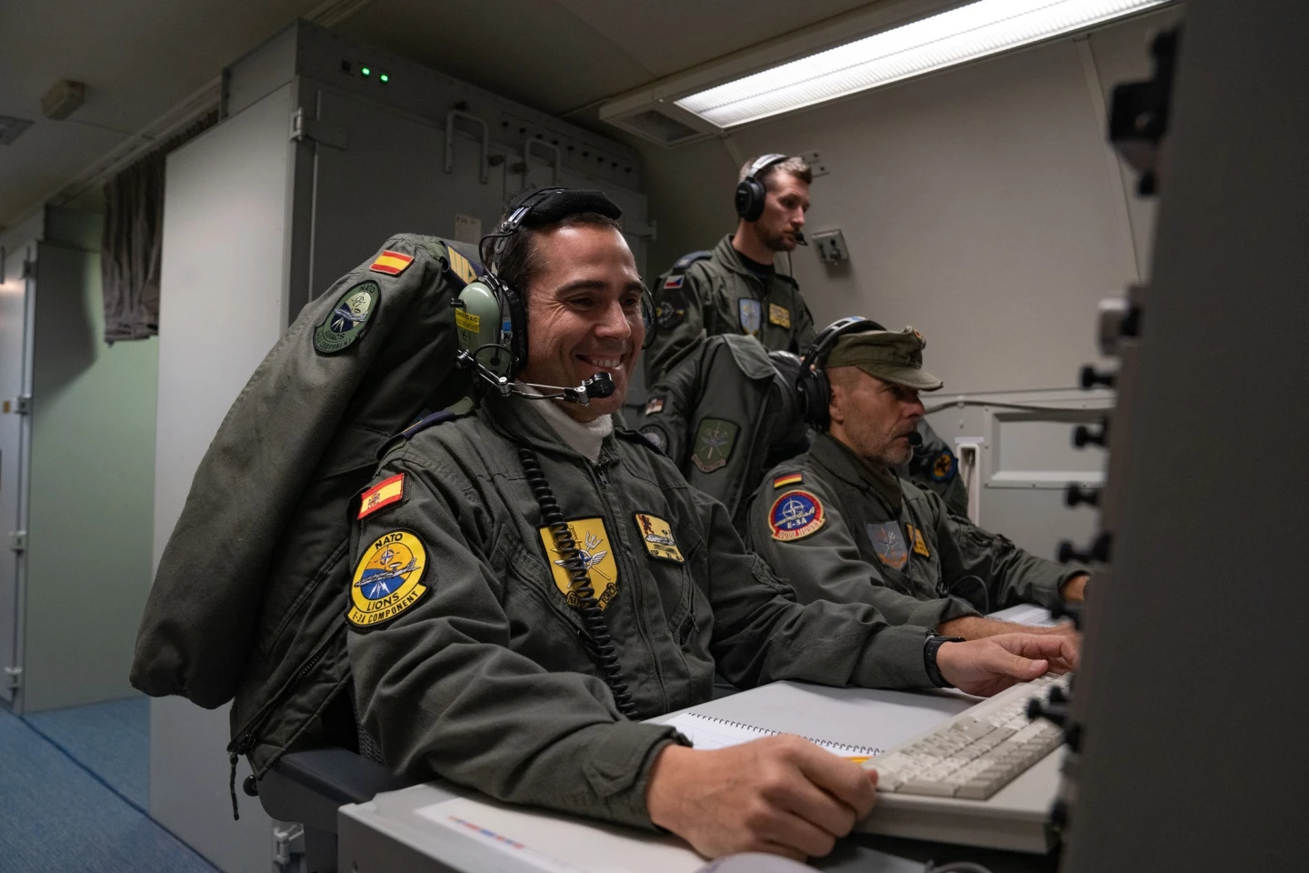 E-3 AWACS specialists at their plane stations