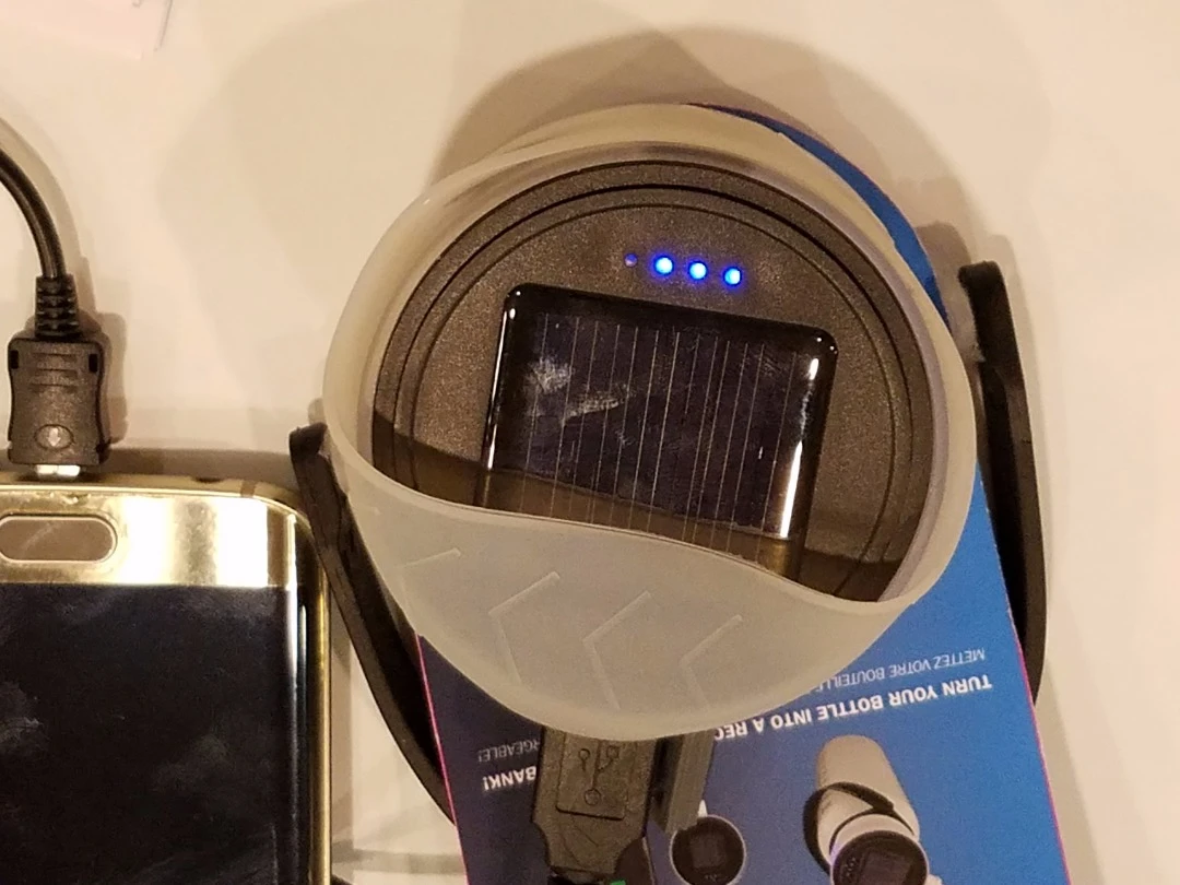 The PowerLid has a built-in solar panel and can also be USB-charged