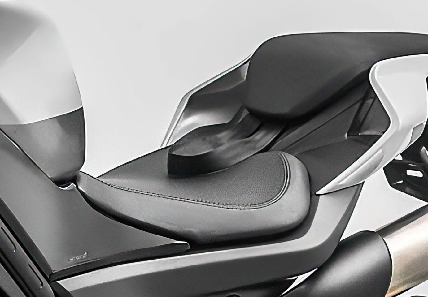 The render shows what looks like a seatbelt strap on the upcoming motorcycle