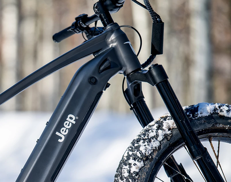 The RidgeRunner Jeep Edition features inverted air fork suspension with 150 mm of travel, and rides on 26-inch rims wrapped in 4.8-inch fat tires