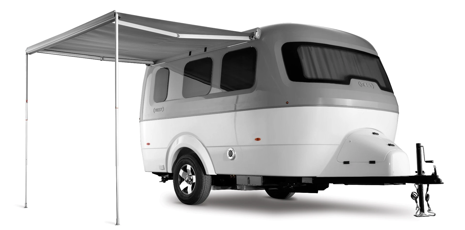 The Nest comes with a generous standard equipment package, including AC, heat, a powered awning and a microwave