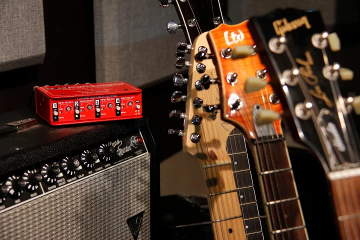 The JX-42 allows players to quietly switch between four guitars and two amplifiers