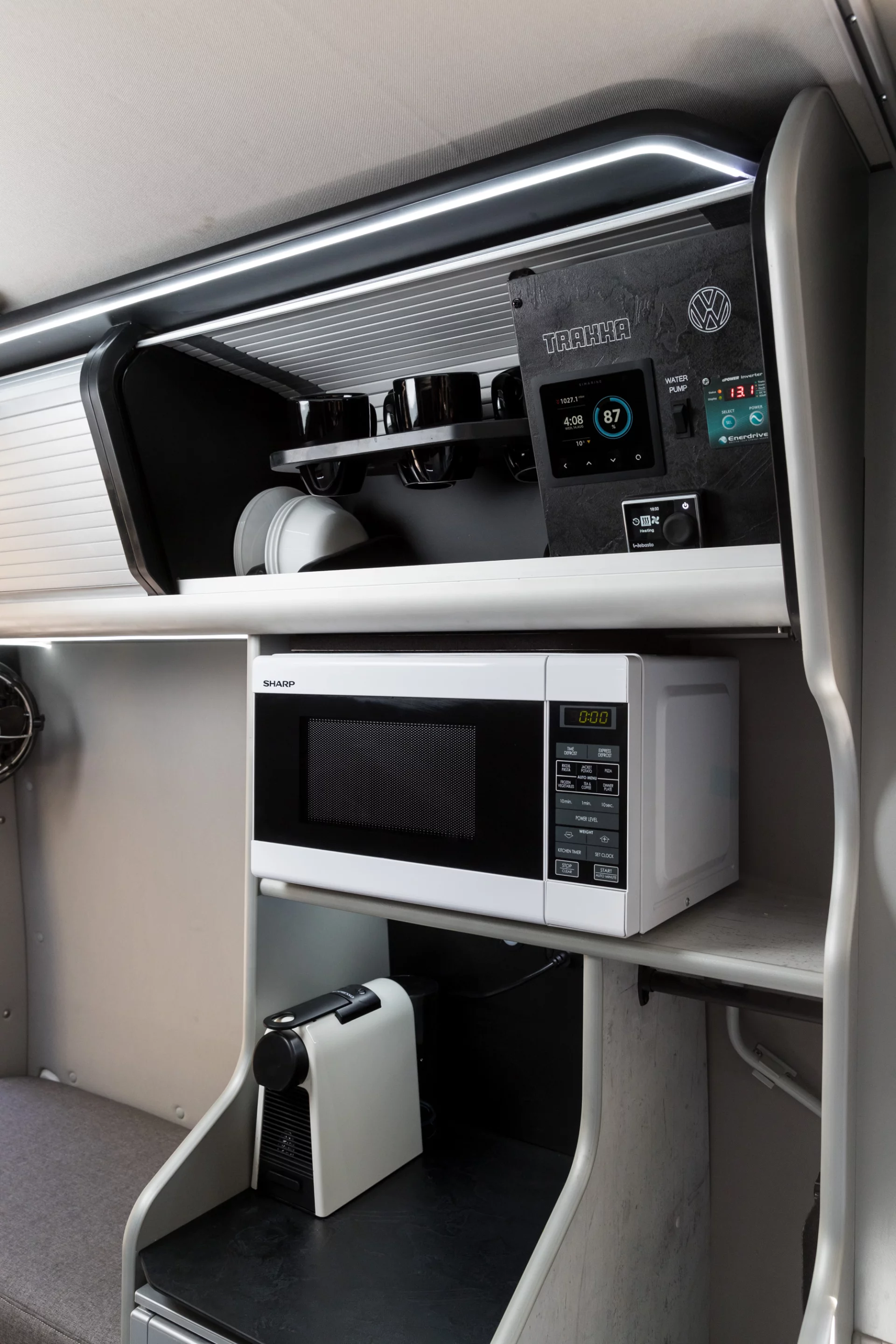 The Buro Kamp includes a microwave, dishes and a systems command center