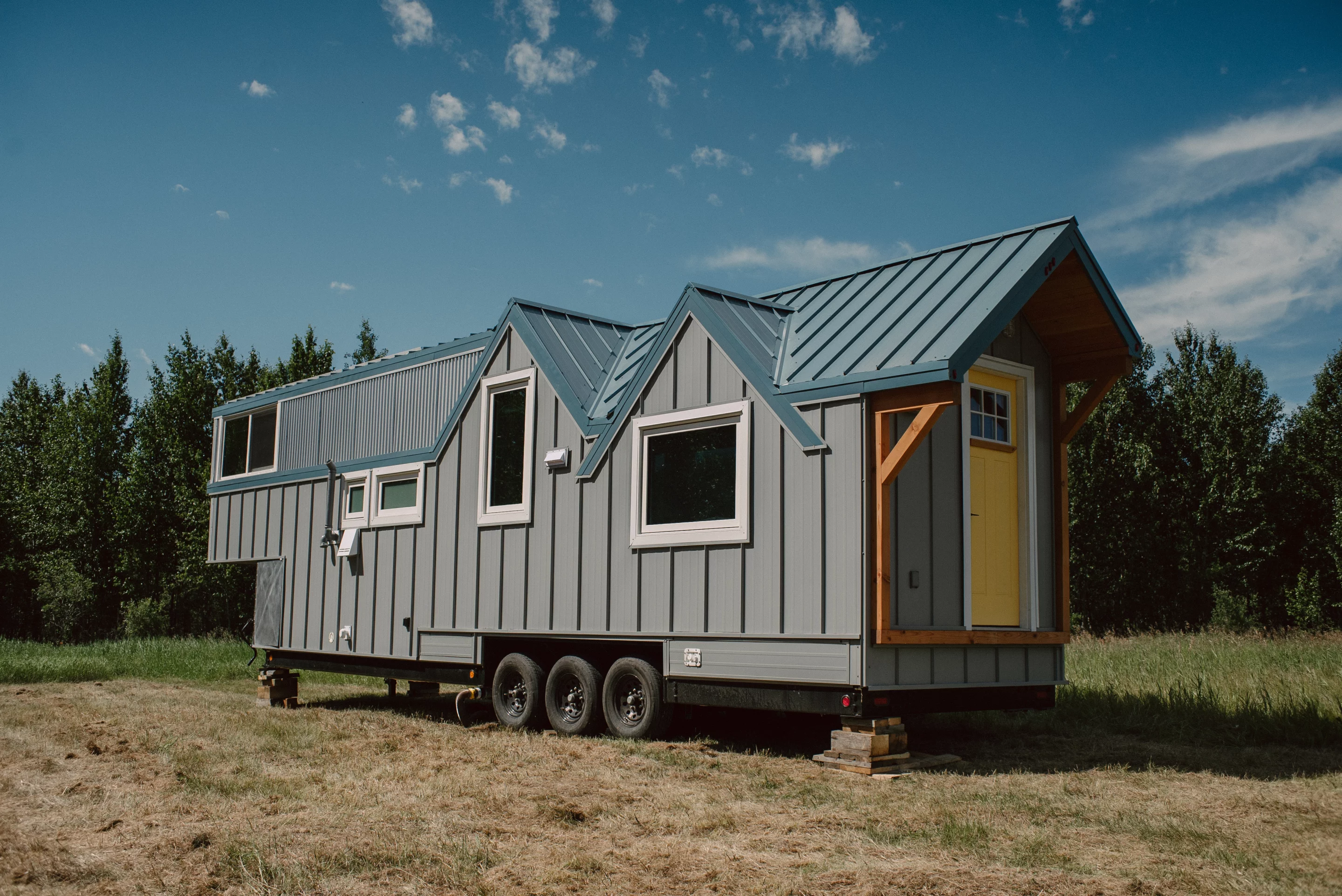 The Macdonald tiny house measures 32 ft (10 m) in length and will be regularly towed throughout North America