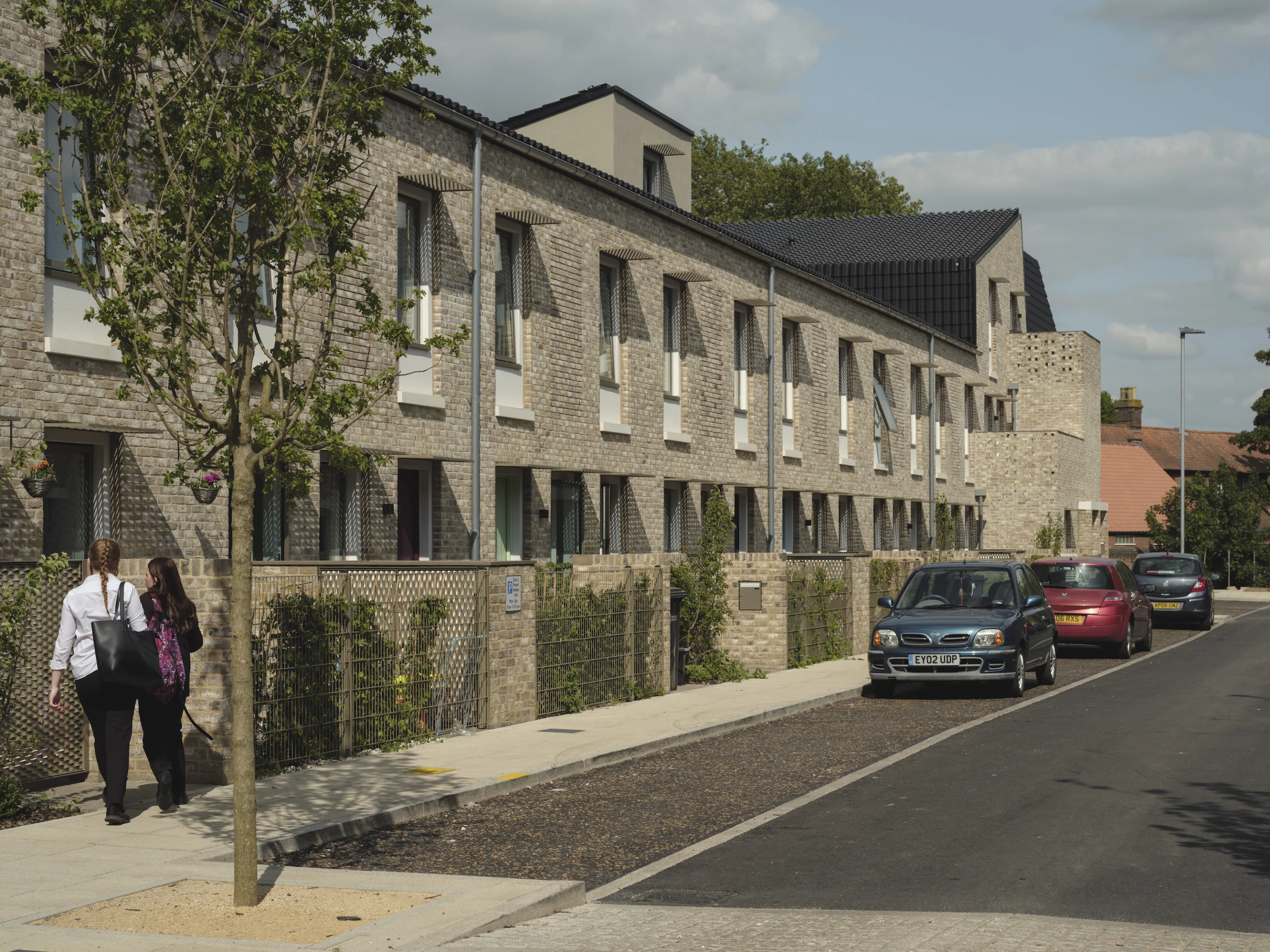 Goldsmith Street's black roof tiles nod to the city's longstanding Dutch trading links and its clay bricks are similar to the ones used in the surrounding Victorian homes