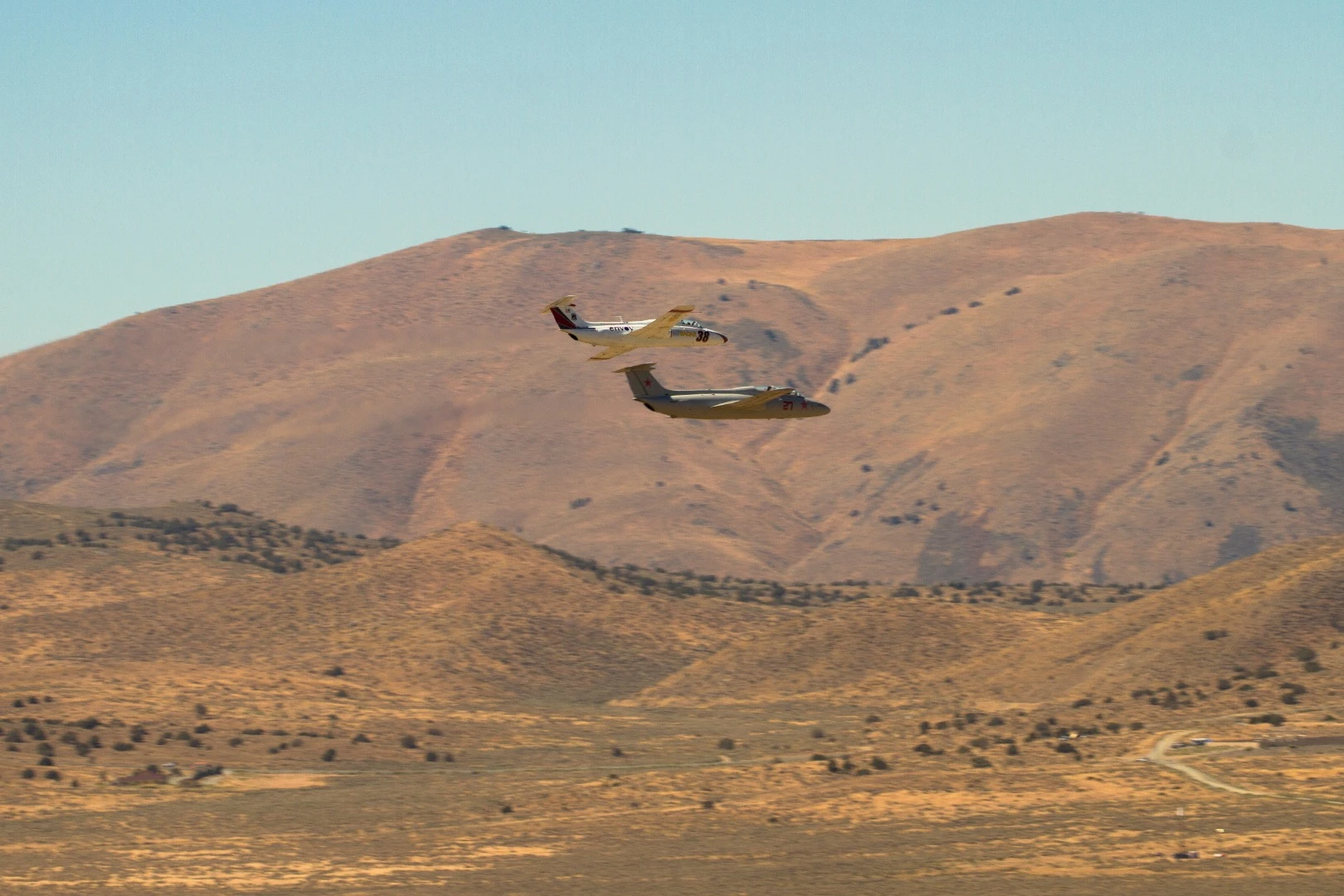 Close racing at the back of the Jet class