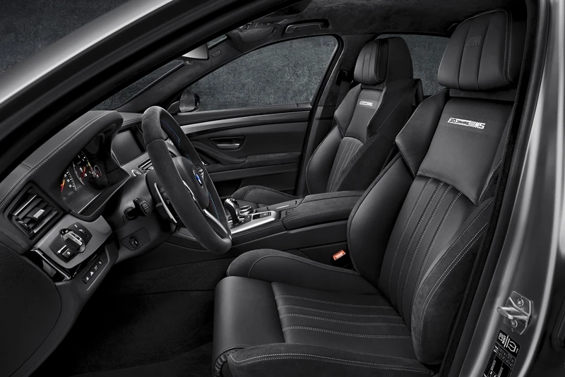 The seats are upholstered in Individual Black Alcantara and Full Merino leather