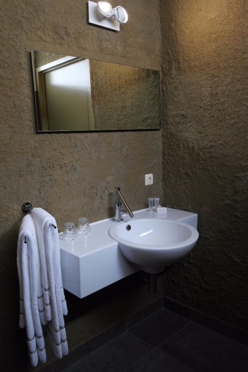 The bathrooms are described as "luxurious," with sand kept to a minimum