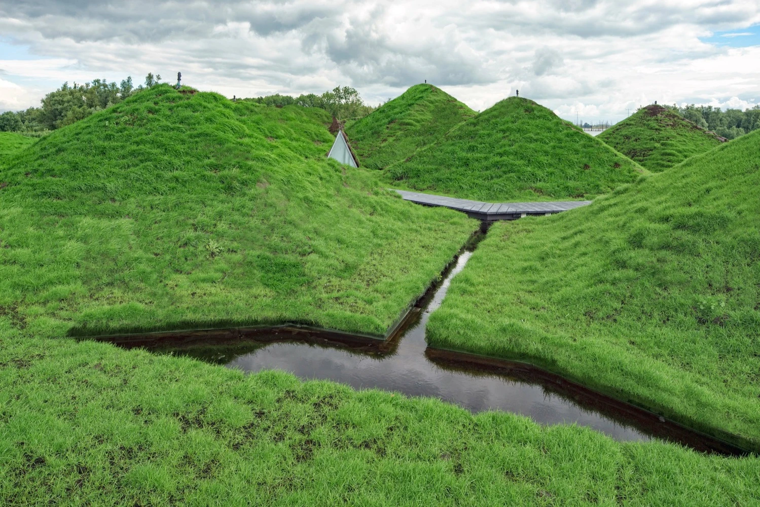 Biesbosch Museum Island is a spectacular green-covered building that blends an artificial structure with an organic quality. From certain angles you wouldn’t even know there is a building there