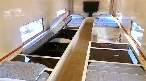 The beds lift up for storage access