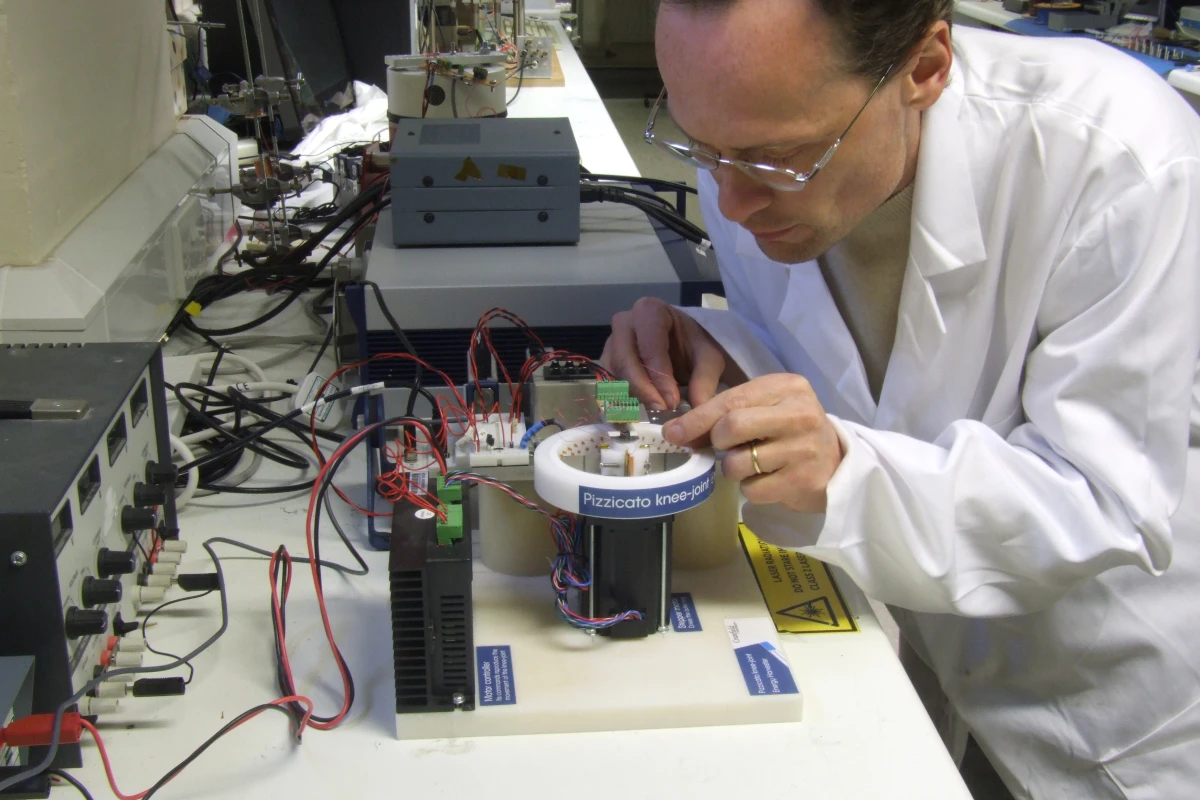 The lab prototype of the pizzicato knee-joint energy harvester