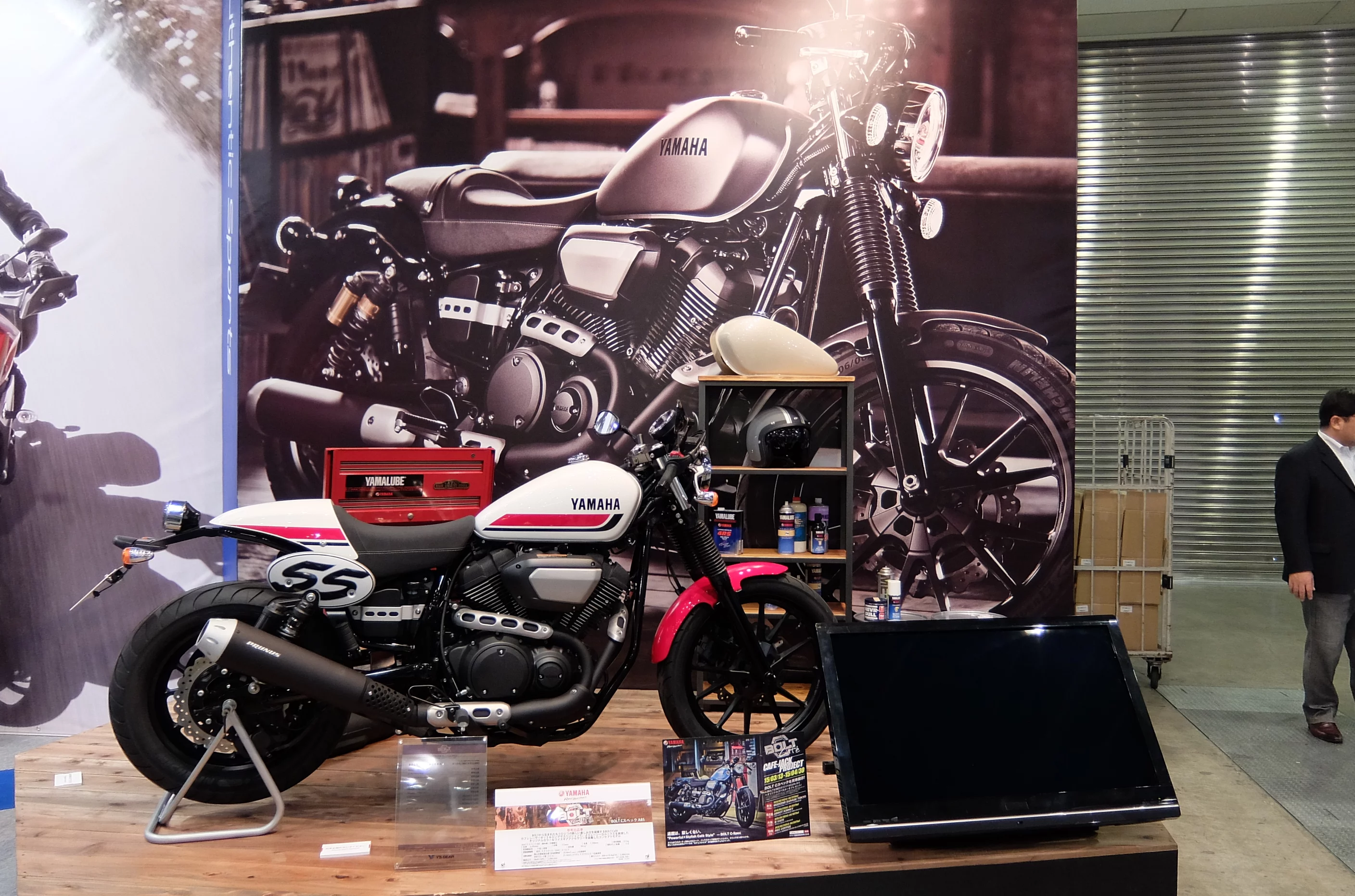 The Bolt-C was shown below a very large photo of the Bolt Cafe on which it is based (Photo: Stephen Clemenger/Gizmag.com)