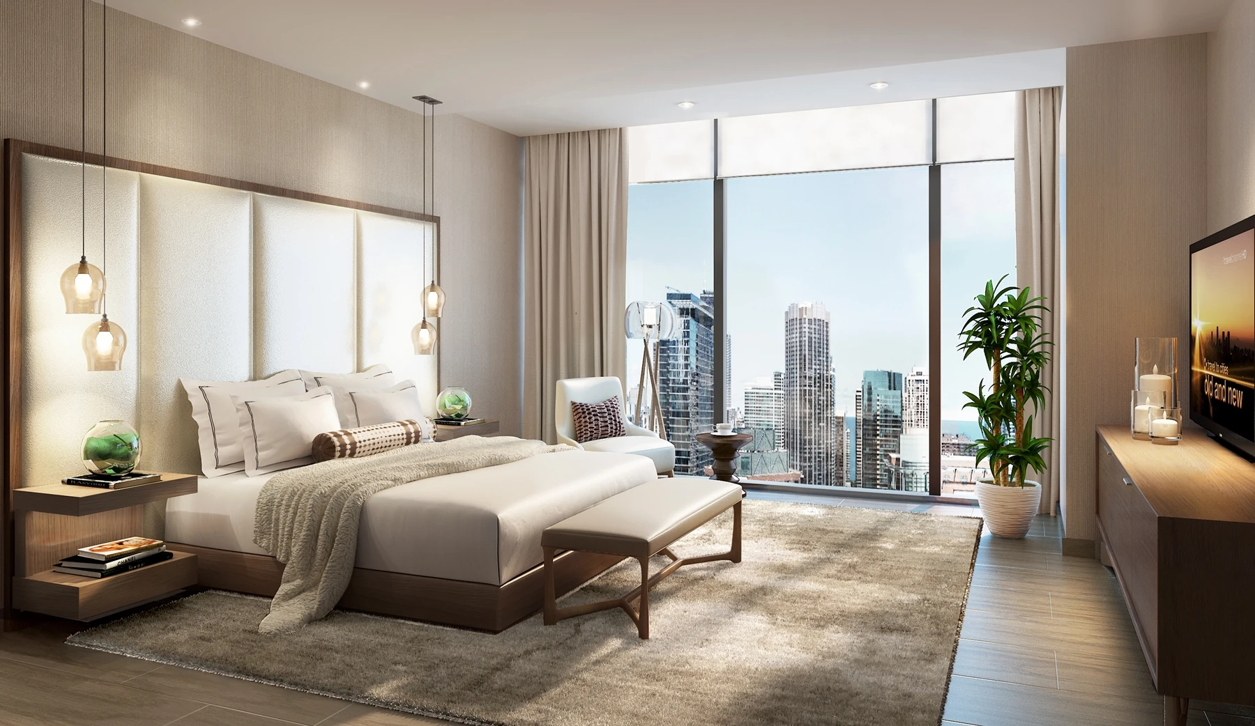 A master bedroom at the Vista Tower finished in a topaz palette