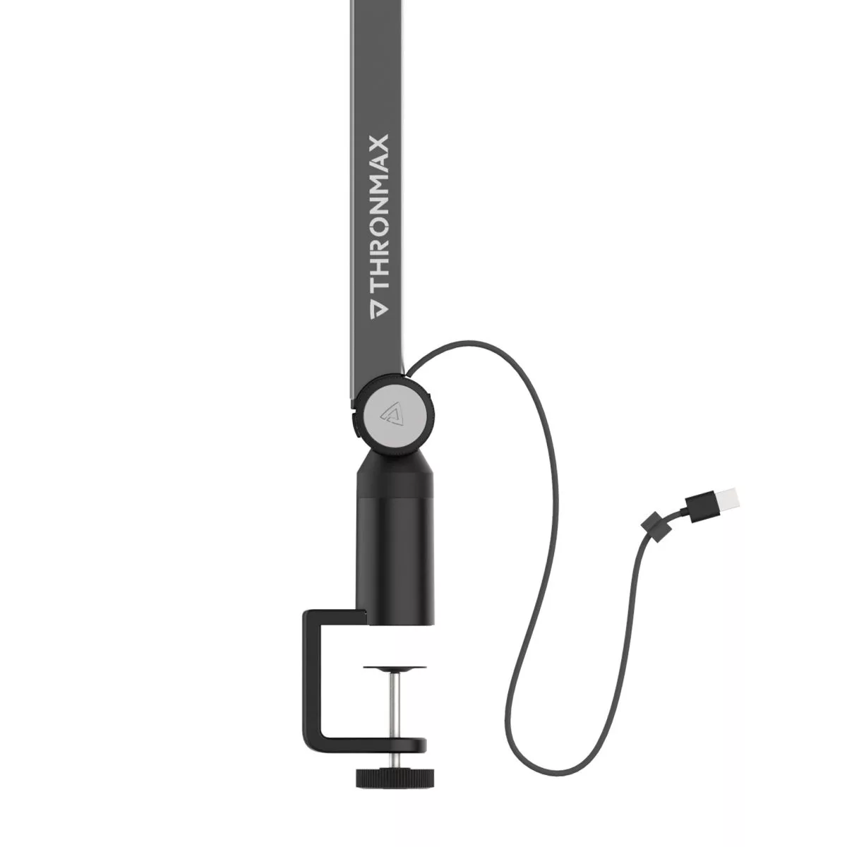 Caster boom stand clamps to a desk
