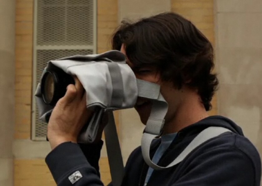 The Cloak Bag is a clever camera carrier that allows you to discreetly take photos without ever having to remove your camera from the bag