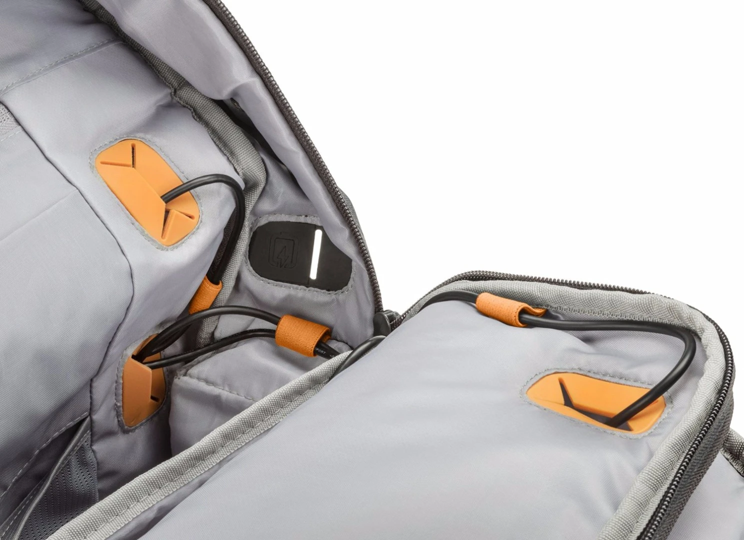 The bag features neat cable organization