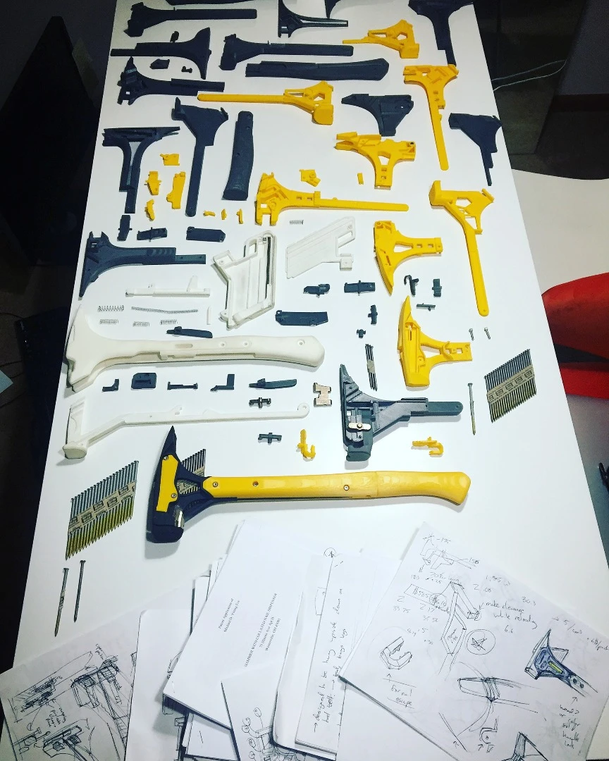The prototype of Michael Young's single-handed hammer is made from 3D-printed plastic parts