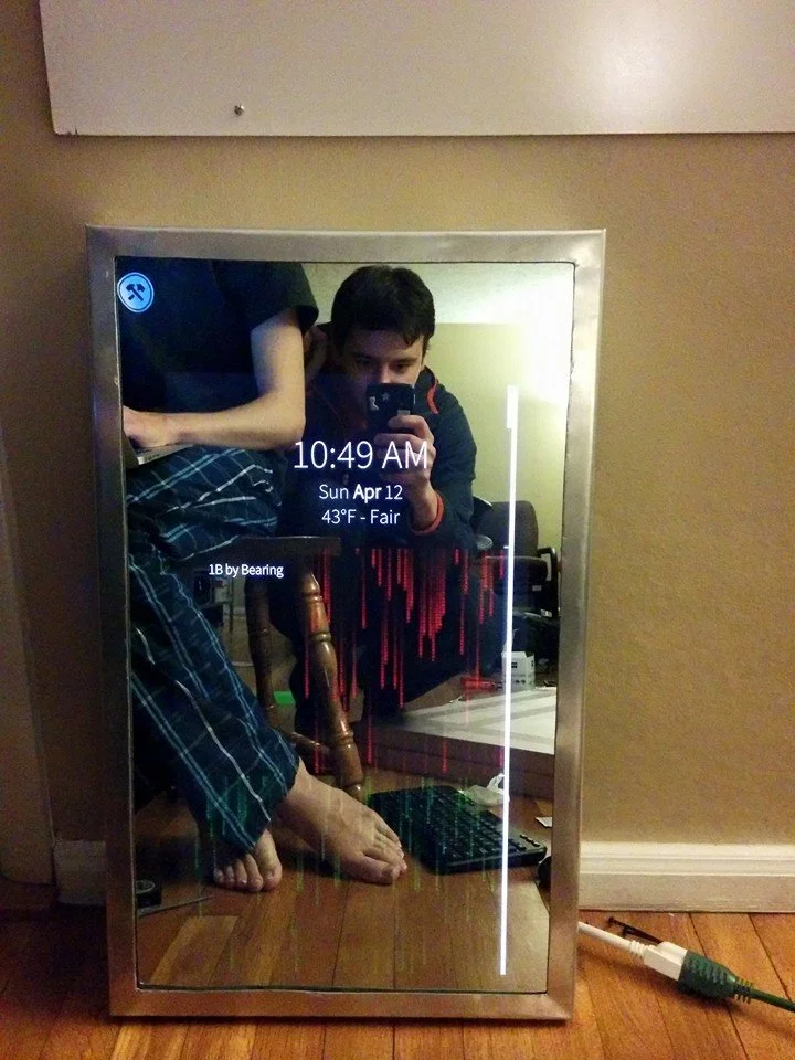 MirrorMirror displays digital info, along with the user's reflection (Photo: Purdue University)