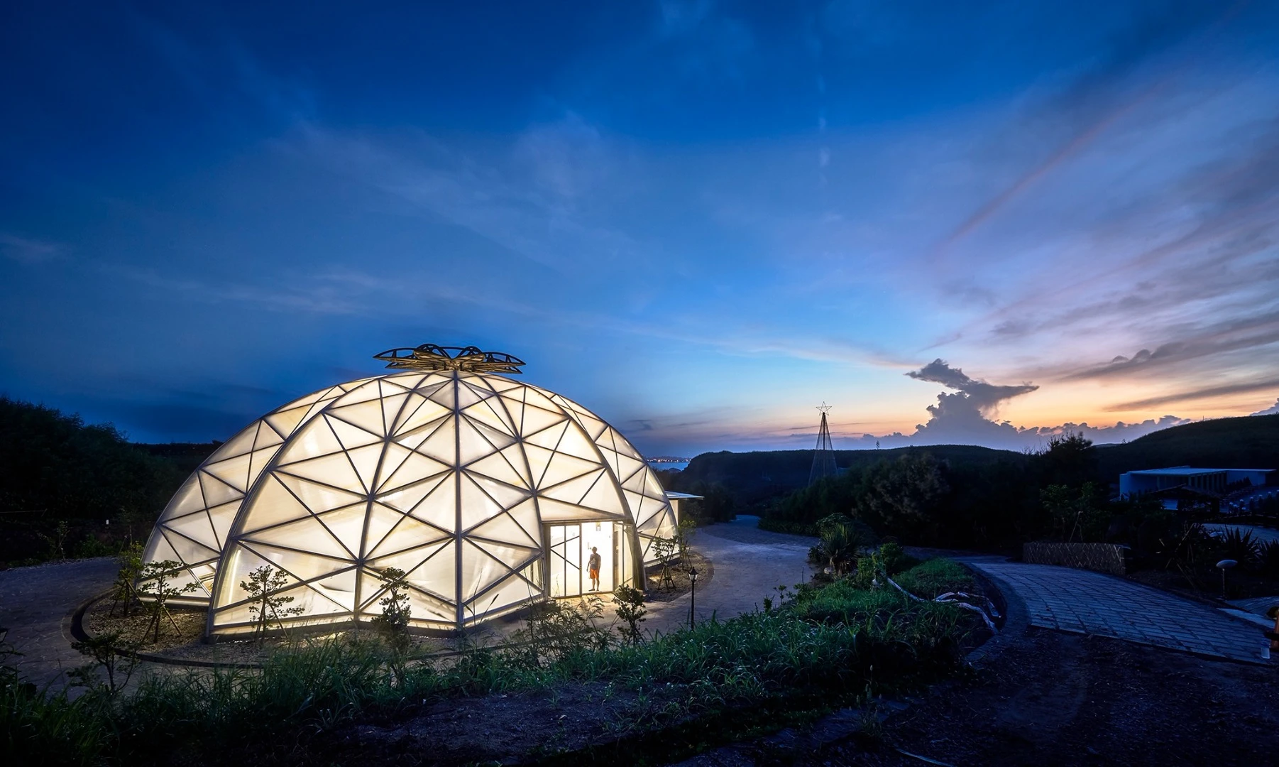 The Echinocactus grusonii cactus greenhouse, which is shaped like a cactus and glows at night, is one of the main attractions at the Penghu Qingwan Cactus Park in Taiwan