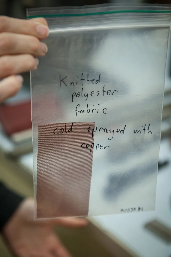 Fine, knitted polyester fabric that has been coated with copper using cold spray technology. The piece remains totally flexible.
