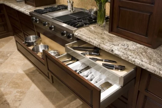 Drawers that open remotely or with the brush of a hand