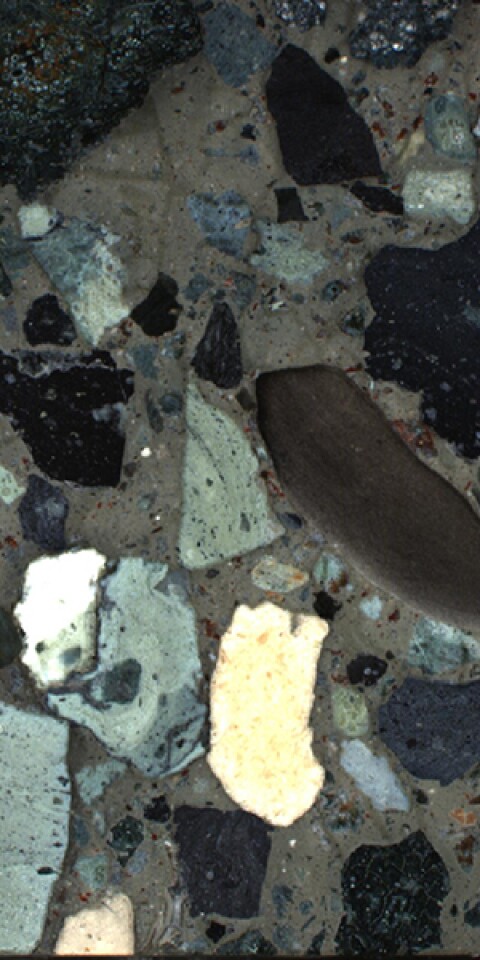 A section of the drilled rock sample taken from the Chicxulub crater, showing different types of rock that were washed into the crater following the impact