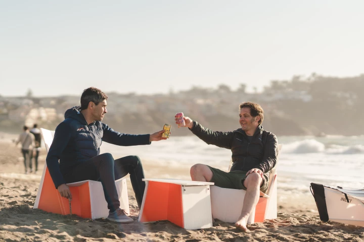 Oru pulls its origami construction out of the water and brings it into the campsite