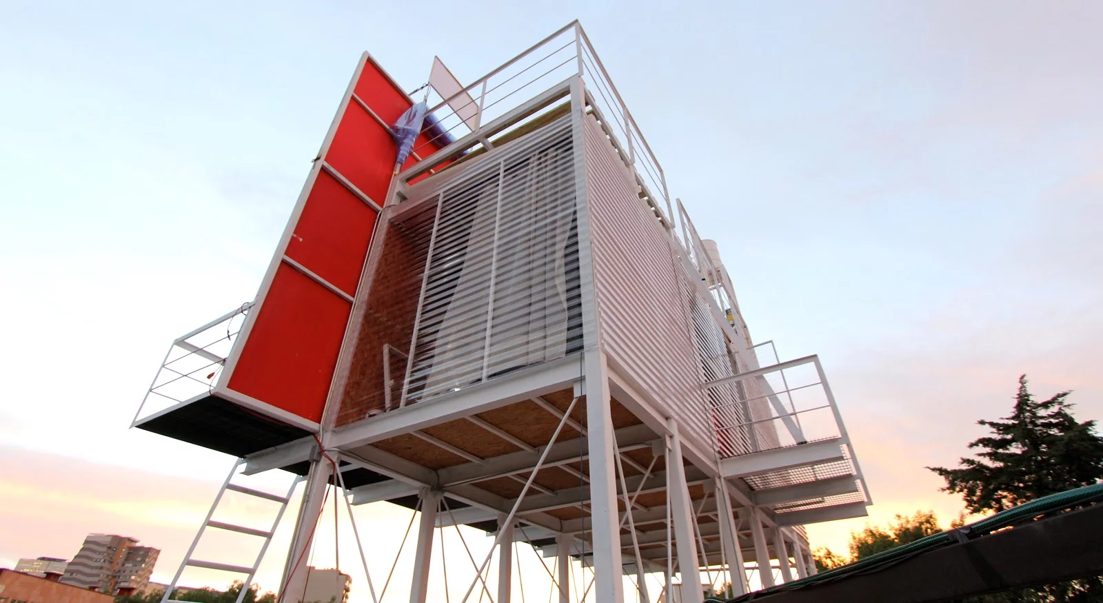 People can only enter and exit through a door concealed on the front of the billboard, though a small balcony does protrude from the back