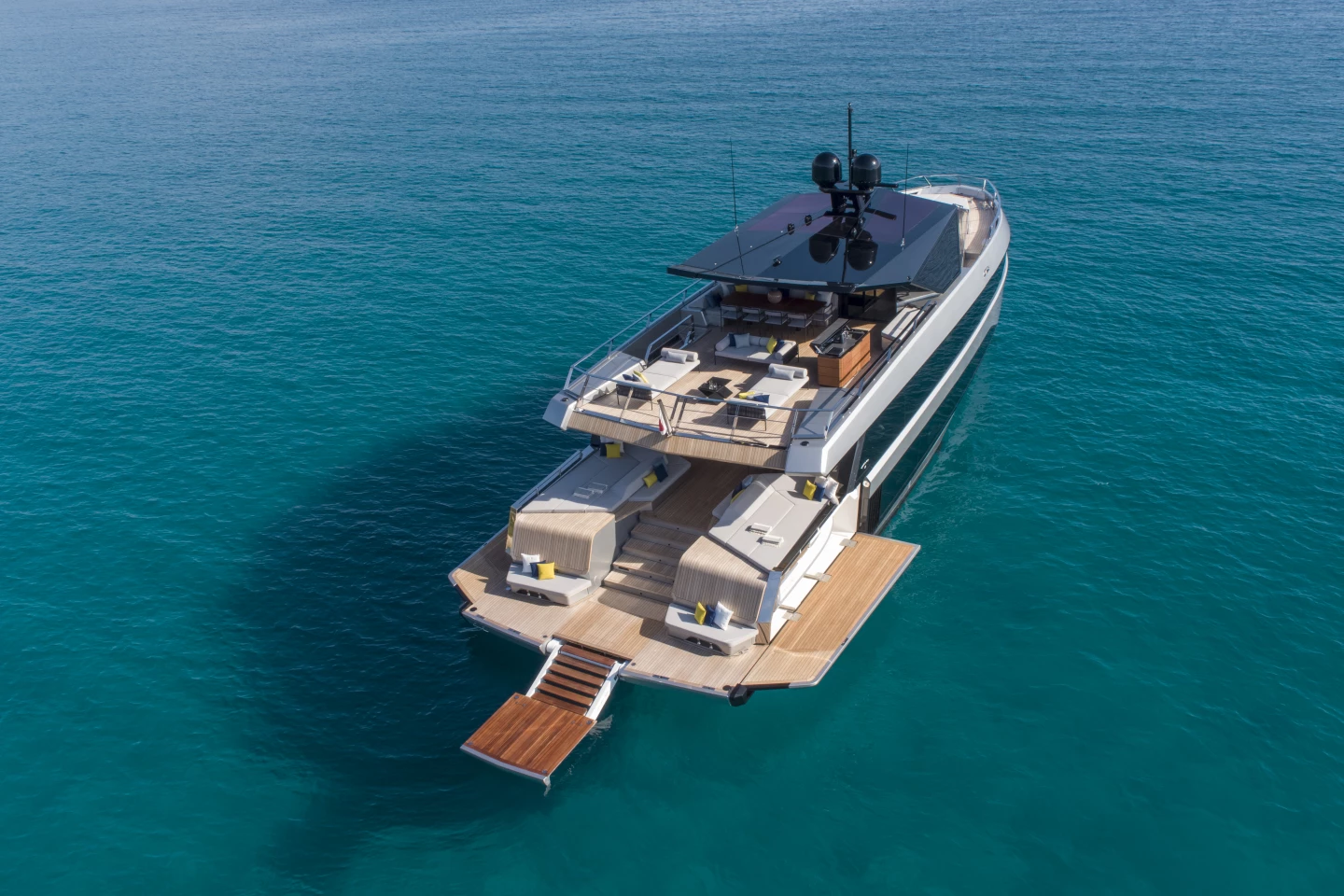 The wallywhy200 is fitted with folding beach club bulwarks, allowing guests to access the water from three sides of the yacht