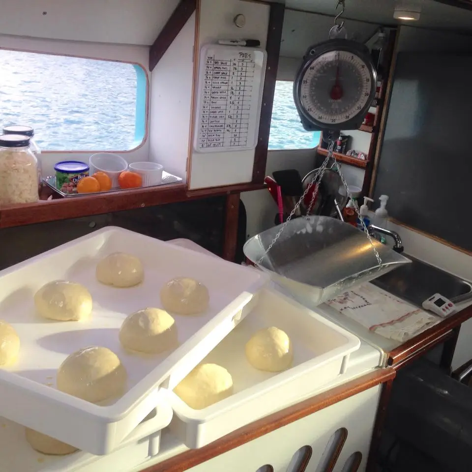 The boat's kitchen was built to accommodate commercial pizza ovens, fridges, bench space and storage