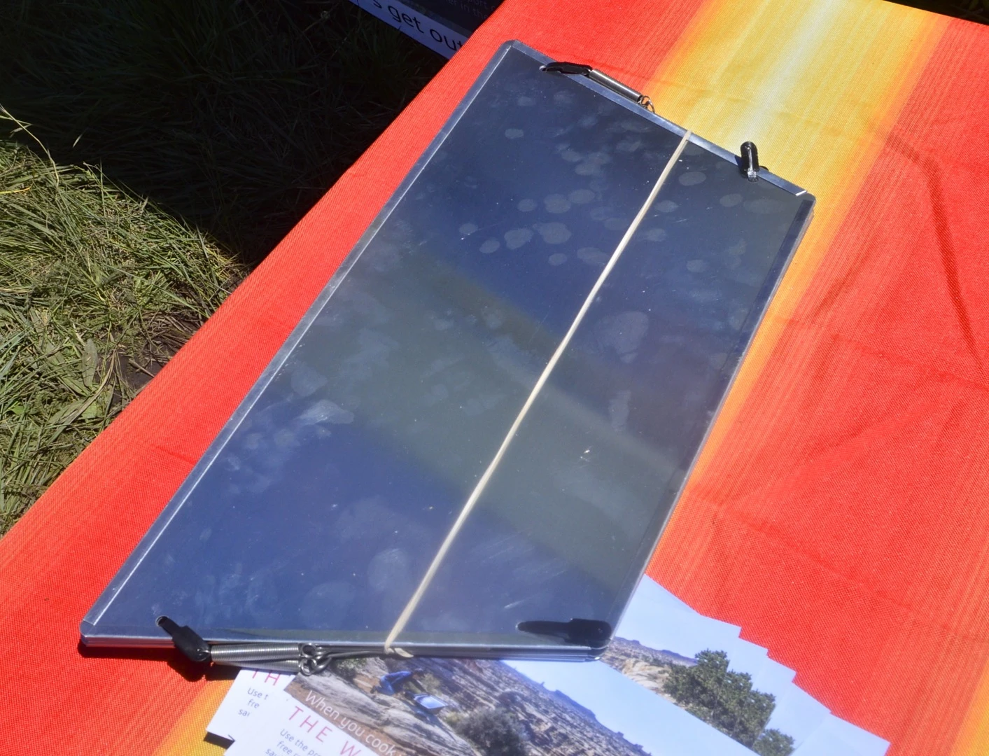 The aluminum reflector collapses for easy transport