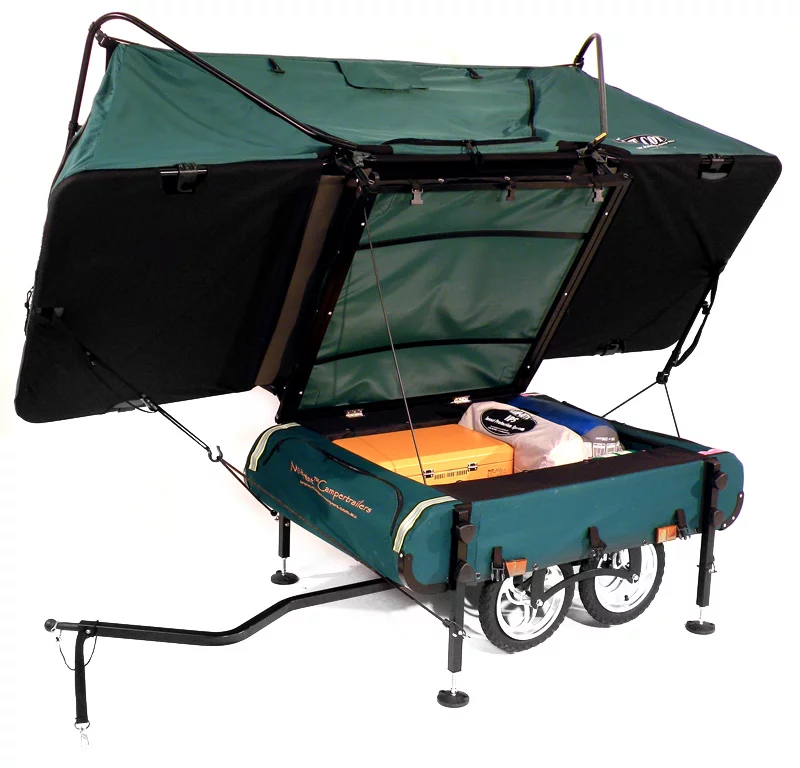 And as large as it is - 56 pounds (25.4 kg) in weight packing in 180 liters (48 US gallons) of storage - Kamp-Rite does not intend that the Bushtrekka be confined to sedate cycle paths