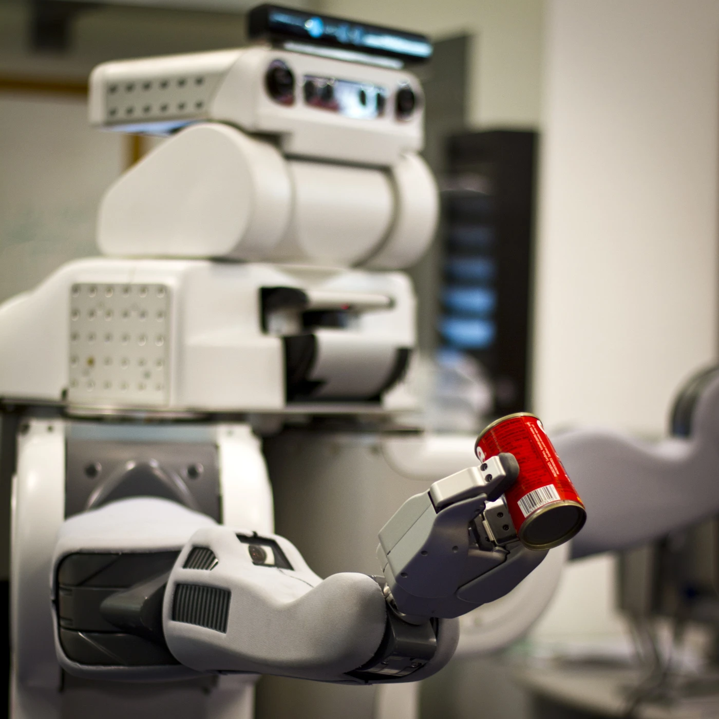 The researchers test their program on a real-life robot, which is able to decide that a can needs to be picked up, then plan and execute the actual motions necessary to lift it from a table (Image: Melanie Gonick)