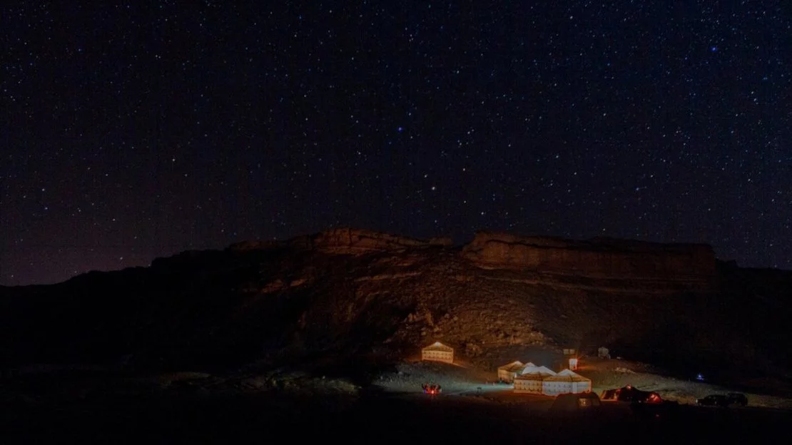 Tents under desert sky