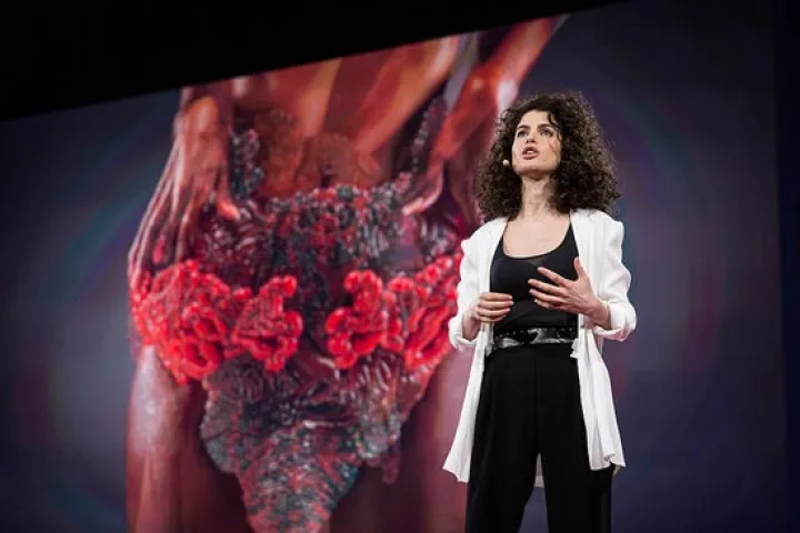 MIT professor Neri Oxman has displayed what is claimed to be the world’s first 3D-printed photosynthetic wearable embedded with living matter