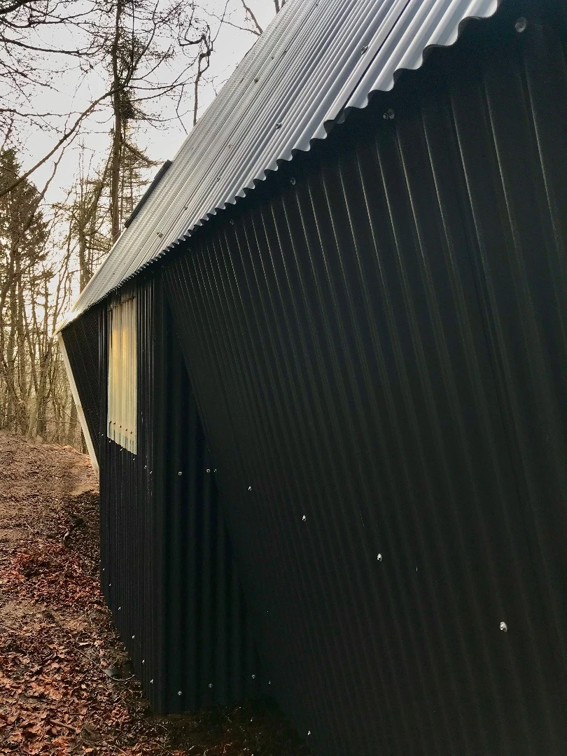 Trailer is clad in corrugated fiberglass and steel