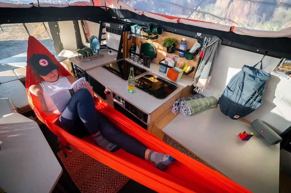 Need an extra sleeping berth? Hang a hammock between the front and rear bed areas