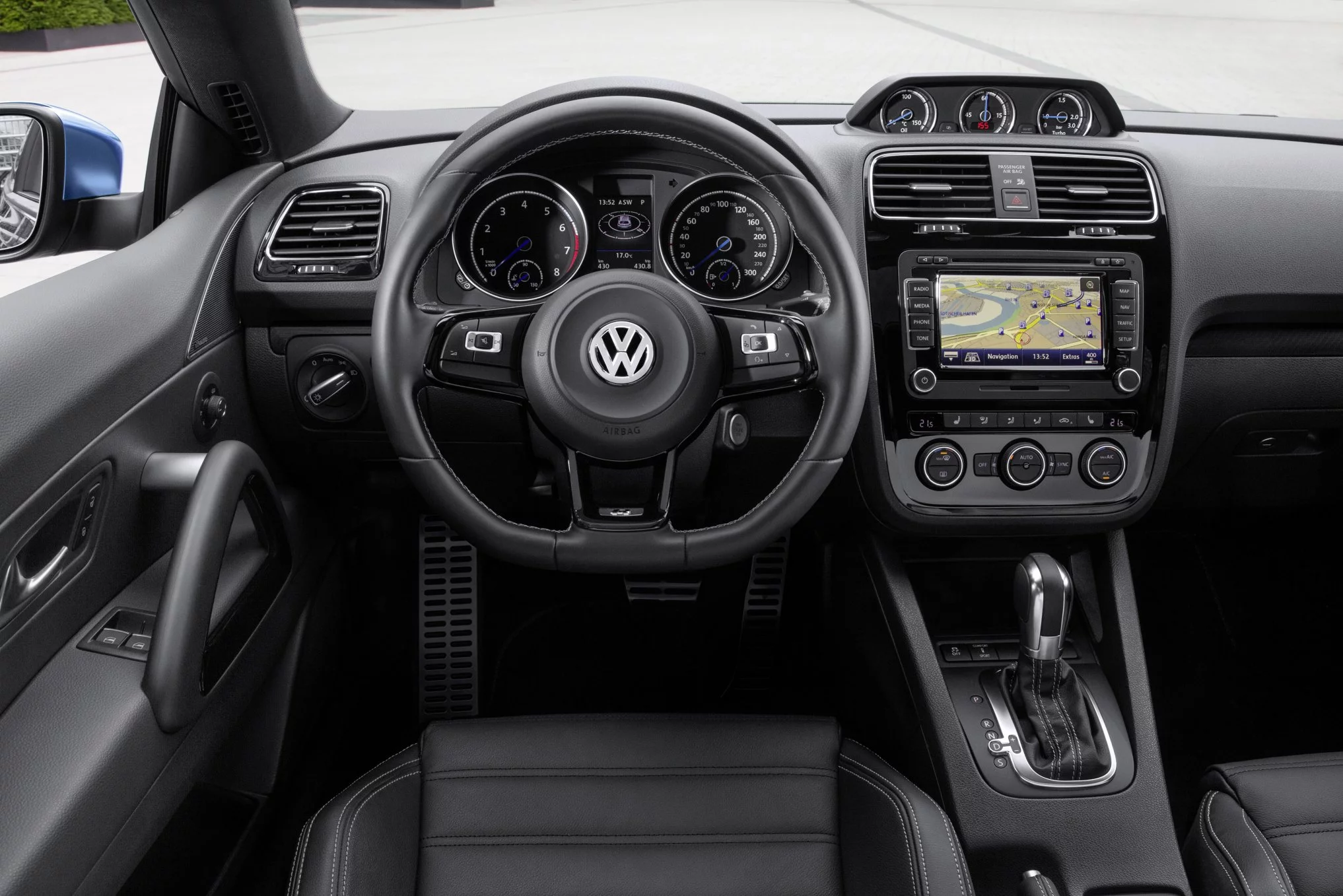 A leather-wrapped steering wheel is standard on new Sciroccos