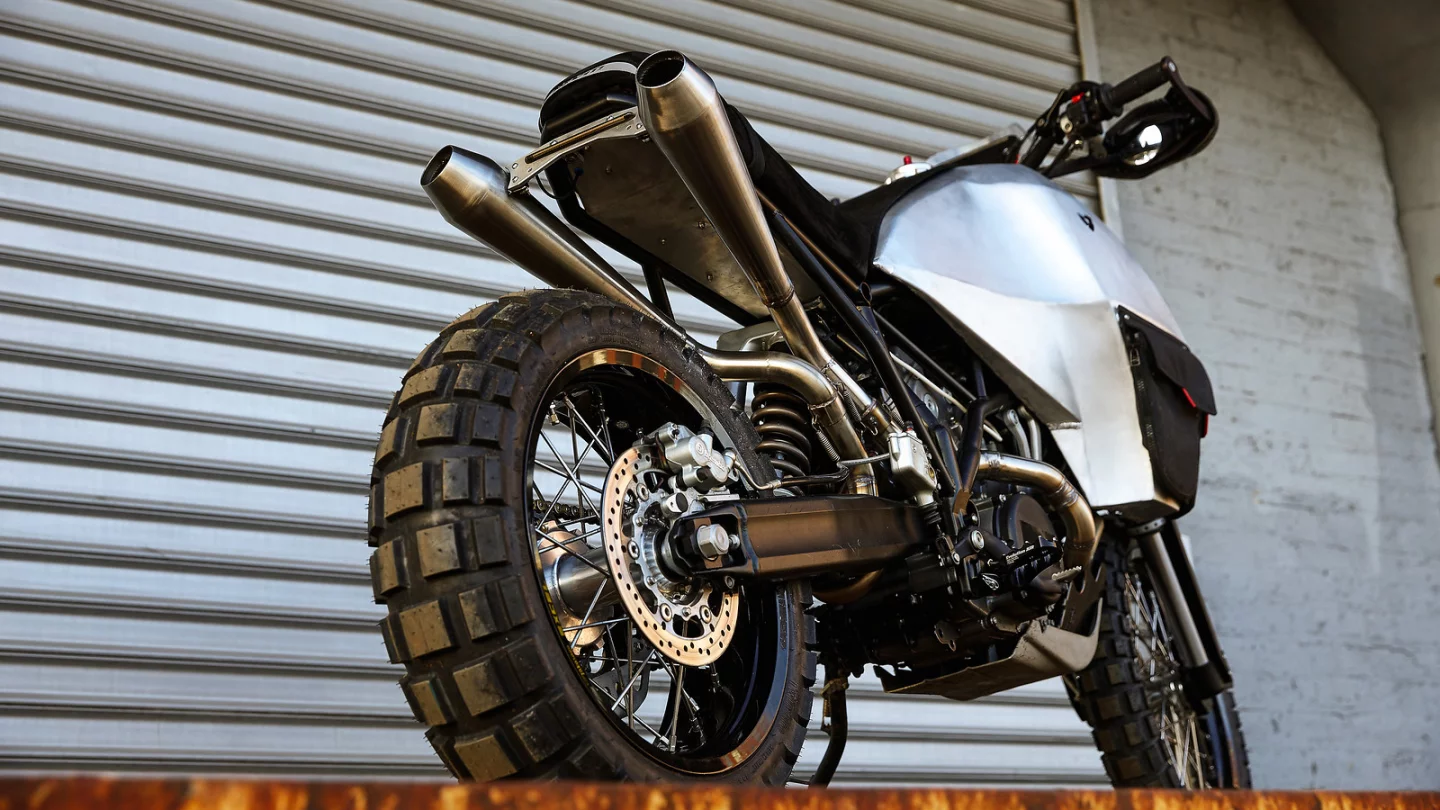 Beautiful custom made exhausts dominate the rear