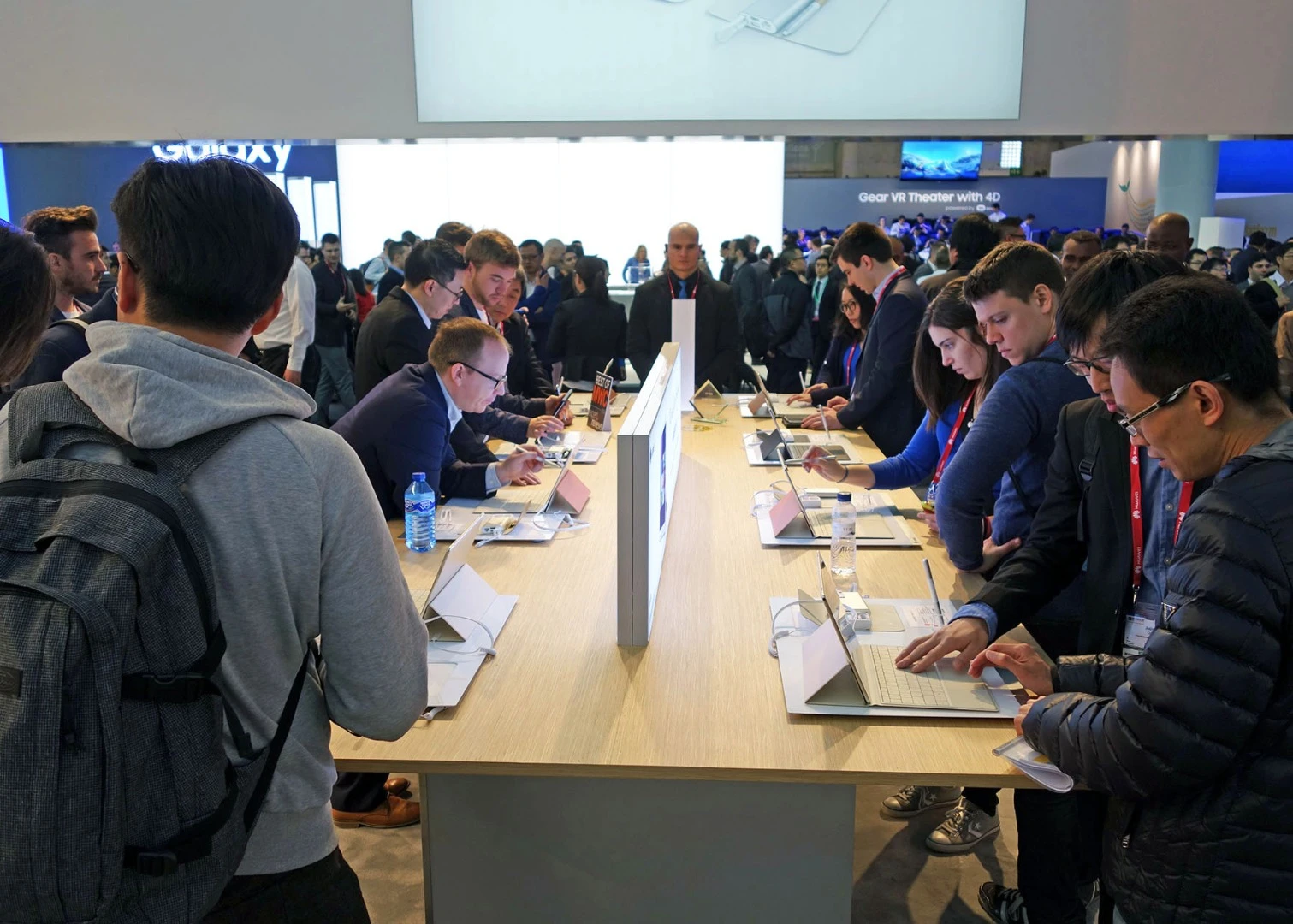 Some stands were busier than others: here attendees take a look at the Huawei MateBook