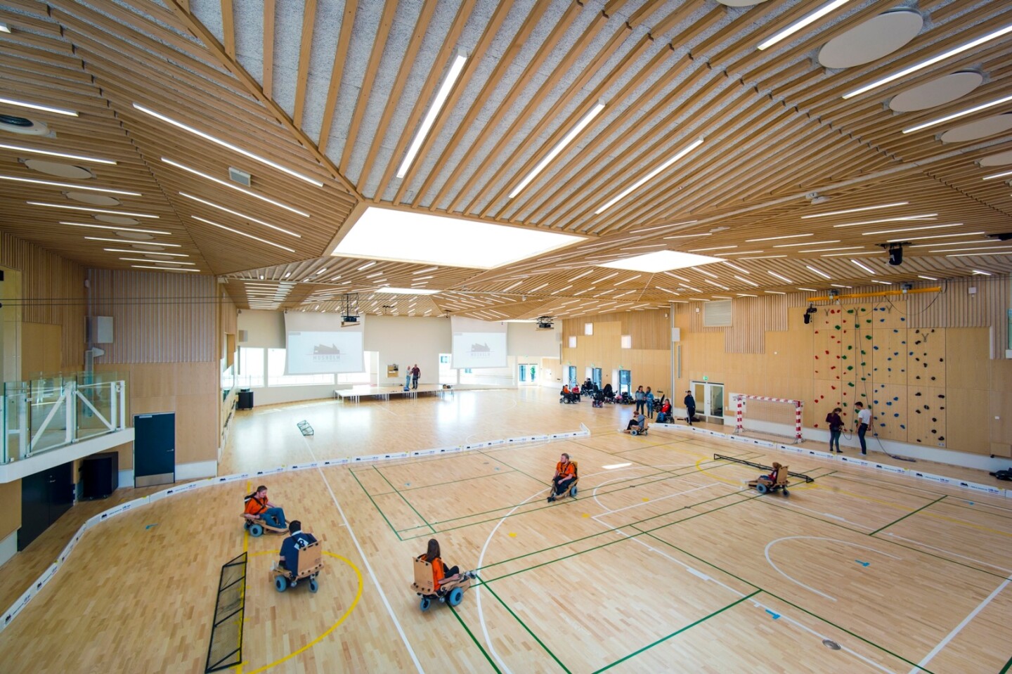 The sports hall features a climbing wall with an integrated pulley that can assist those with disabilities