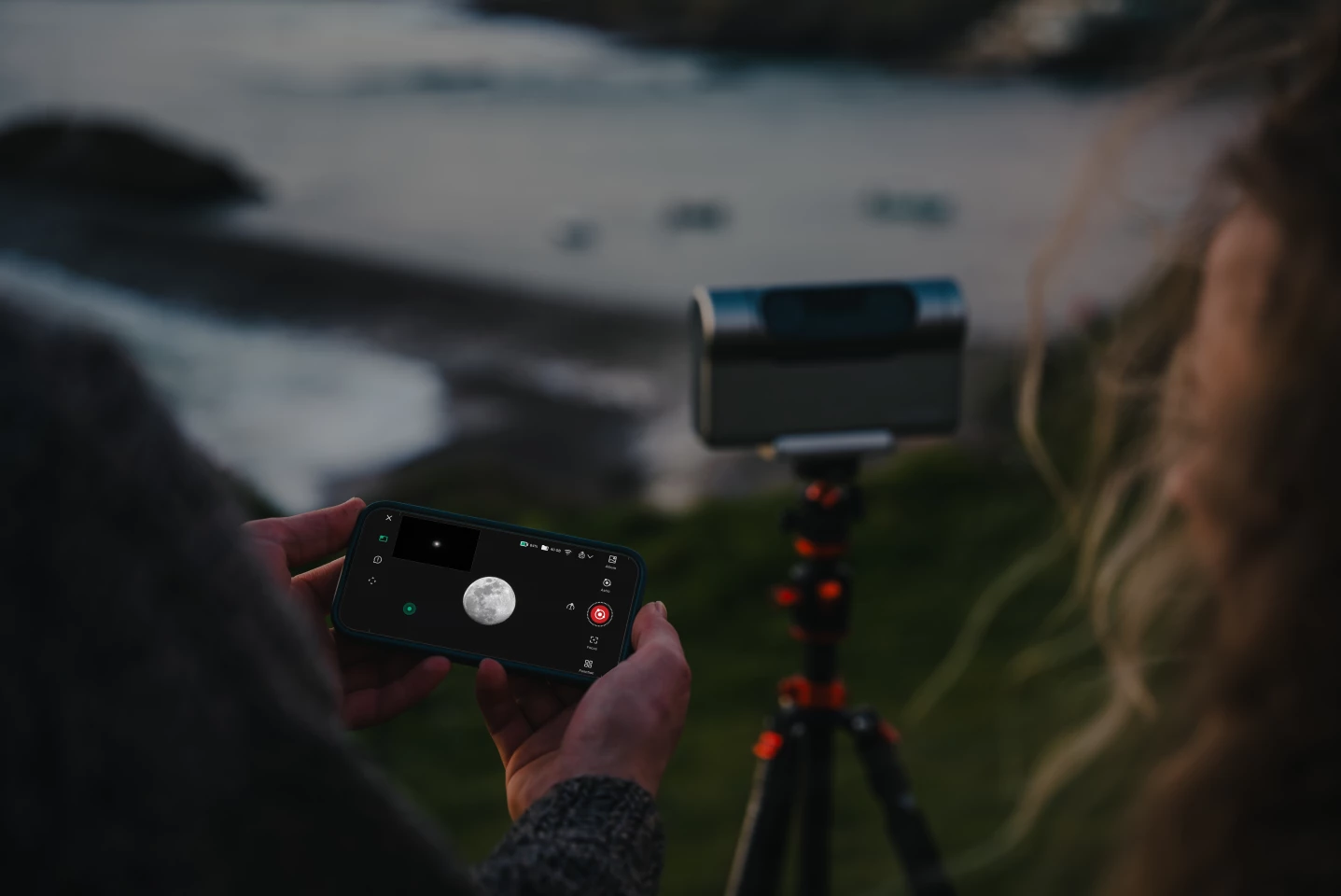The app shows the photo interface here, with the wide-angle view in the top-left box and the telephoto view as the main display