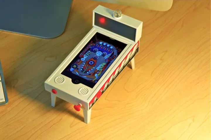 Pinball Magic is an "(app)cessory" that lets an iPhone or iPod touch operate as a miniature digital pinball machine (Photos courtesy New Potato)