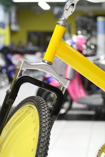 The Shadow Ebike's custom fork and frame designed to accommodate the specially designed wheel