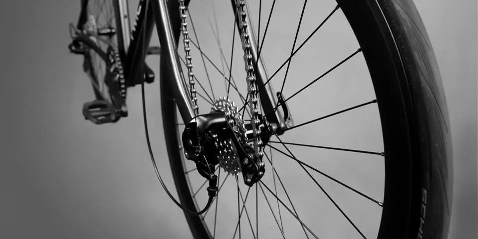A closer view of the front derailleur and cassette