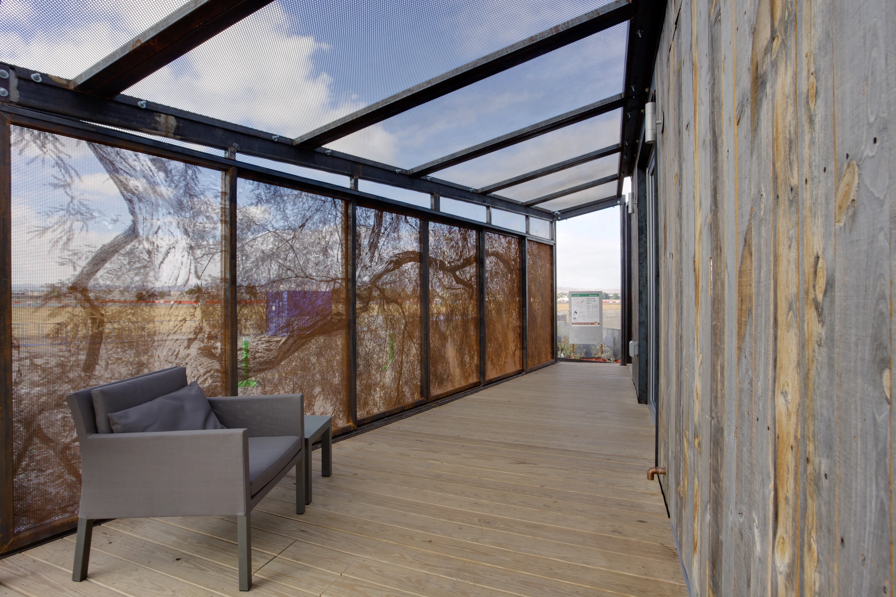 The DesertSol house designed for the Mojave Desert, by University of Nevada Las Vegas, mixes patterned, rusted metal screening and solar shading (Photo: Jason Flakes (Nomoi)/U.S. Department of Energy)